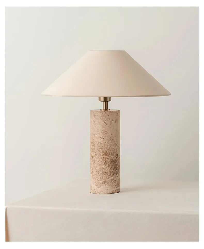 Marble Table lamp with a textured base on a light background