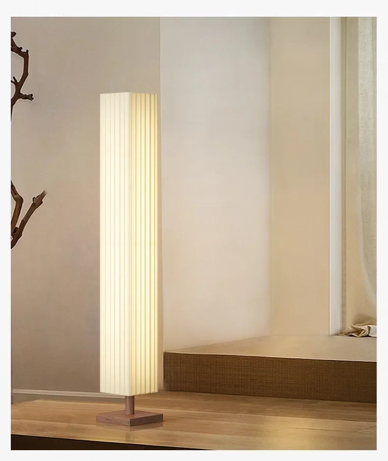 Modern floor lamp in a room with neutral decor