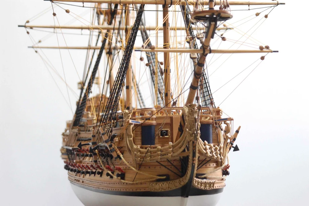 Detailed model of a historical sailing ship on a white background